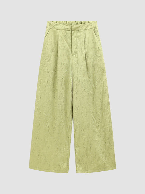 Pantalones anchos plisados ​​de satén texturizado