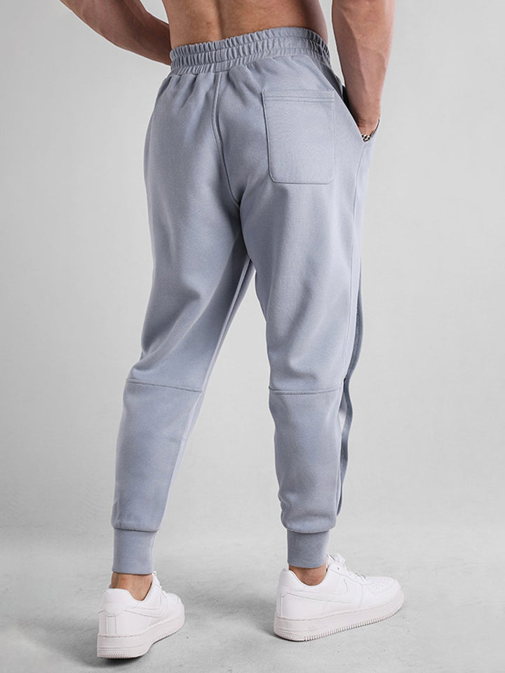 Pantalón deportivo holgado con botones 